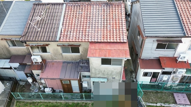 京都市伏見区で板金屋根の部分修理を提案、瓦との境目からの雨水流入